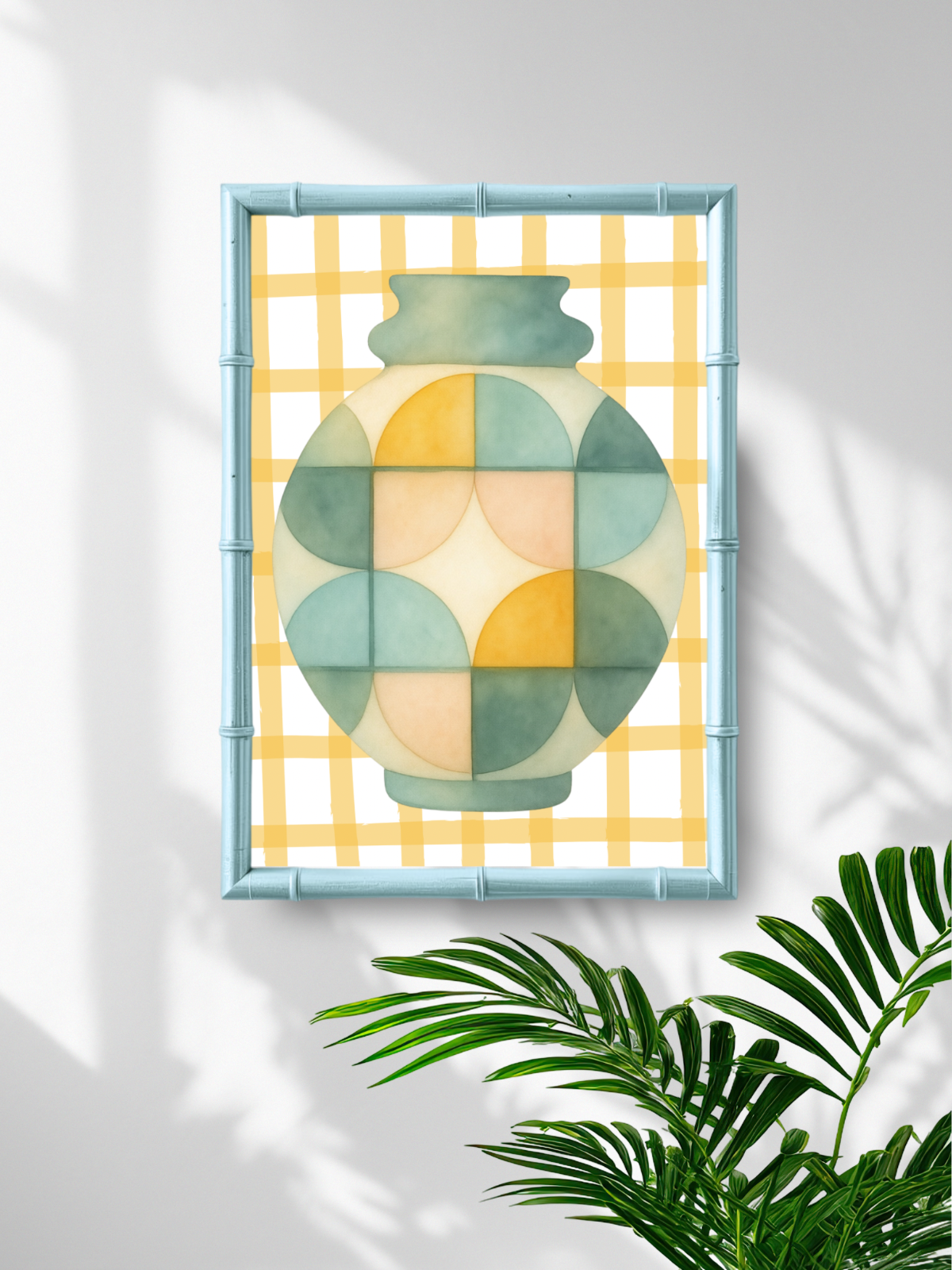 Geometric vase design in a frame on a wall with a plant in the foreground