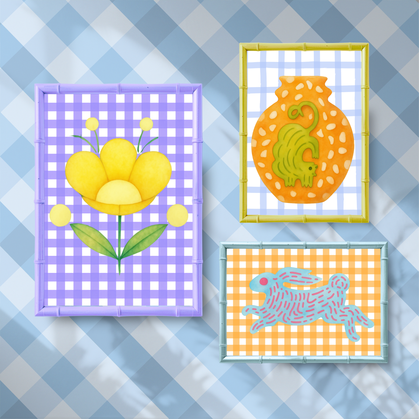 Three colorful framed artworks on a checkered background