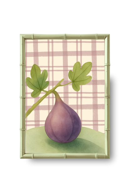 Framed artwork of a purple fig with green leaves on a plaid background