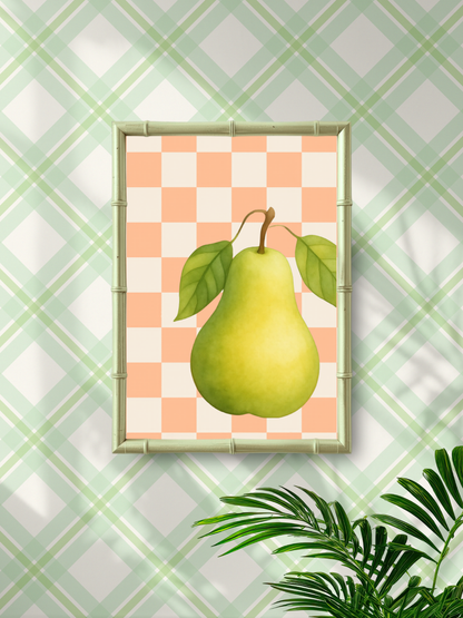 Framed artwork of a green pear on a checkered background with a plant in the corner.