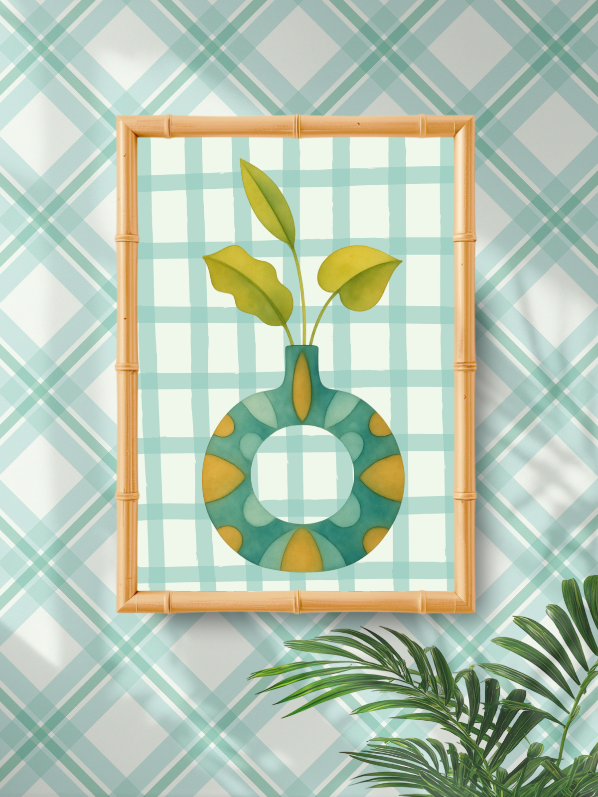 Framed artwork of a green vase with leaves on a checkered wall.