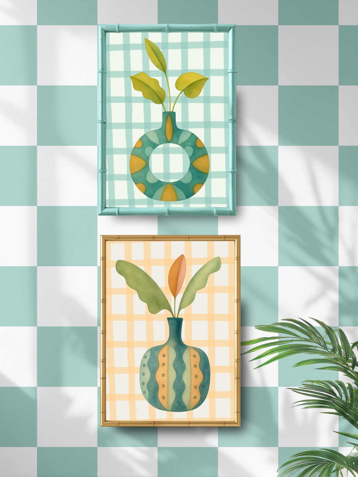 Two framed botanical artworks on a checkered wall with a plant in the corner.